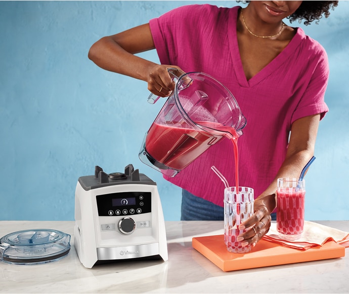 Image of Woman Pouring Smoothie