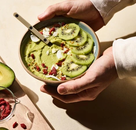 Avocado Smoothie Bowl bowl of avocado smoothie with kiwi