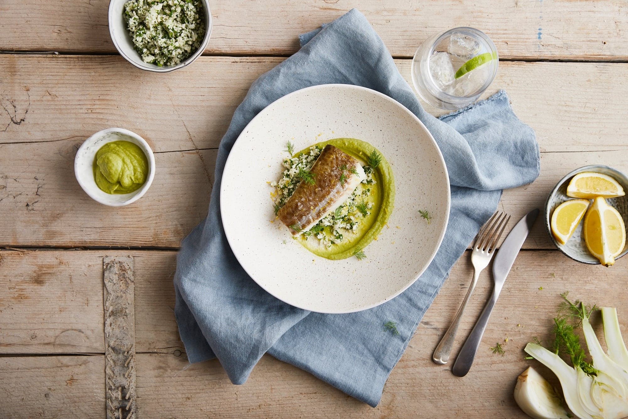 Baked cod with lemon and fennel purée and herby cauliflower rice